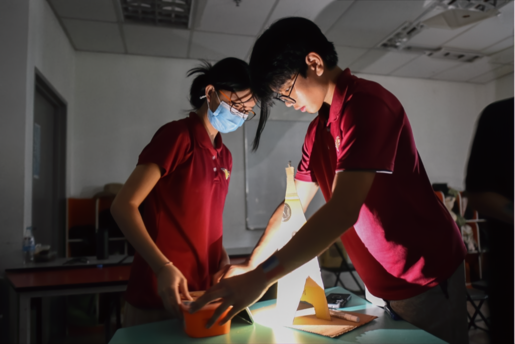 Sri Emas International School secondary students conducting a experiment.