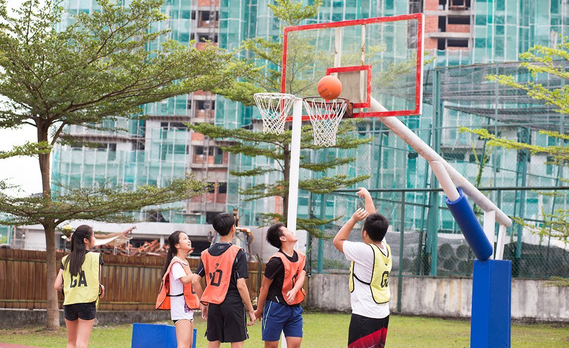 Students playing Basketball in Sri Emas International School.