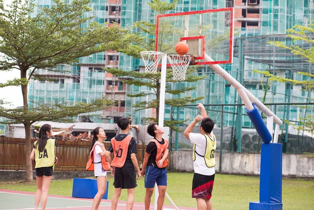 Students playing Basketball in Sri Emas International School.