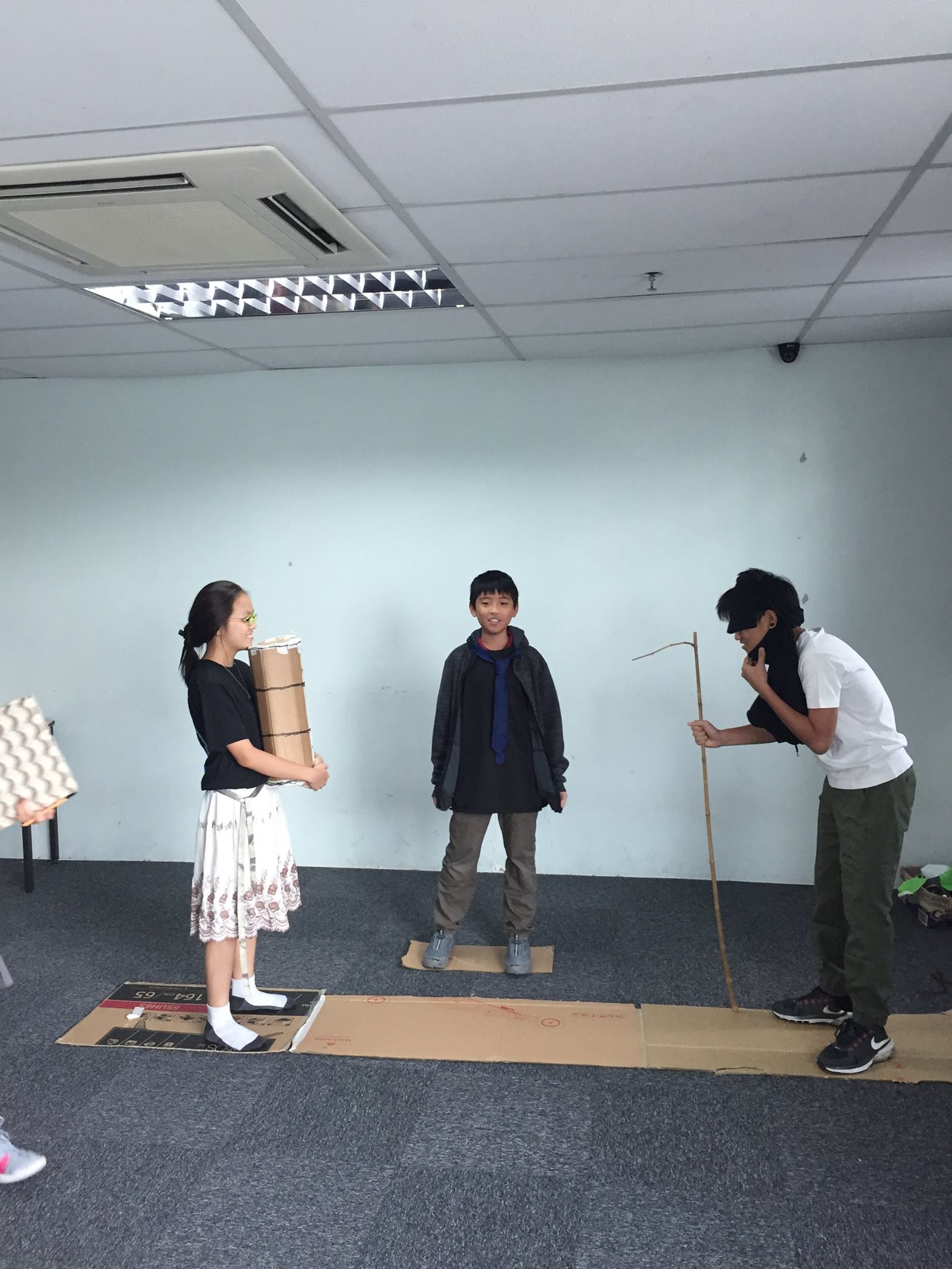 Sri Emas International School students acting out a scene from Robin Hood as part of their coursework for English class.